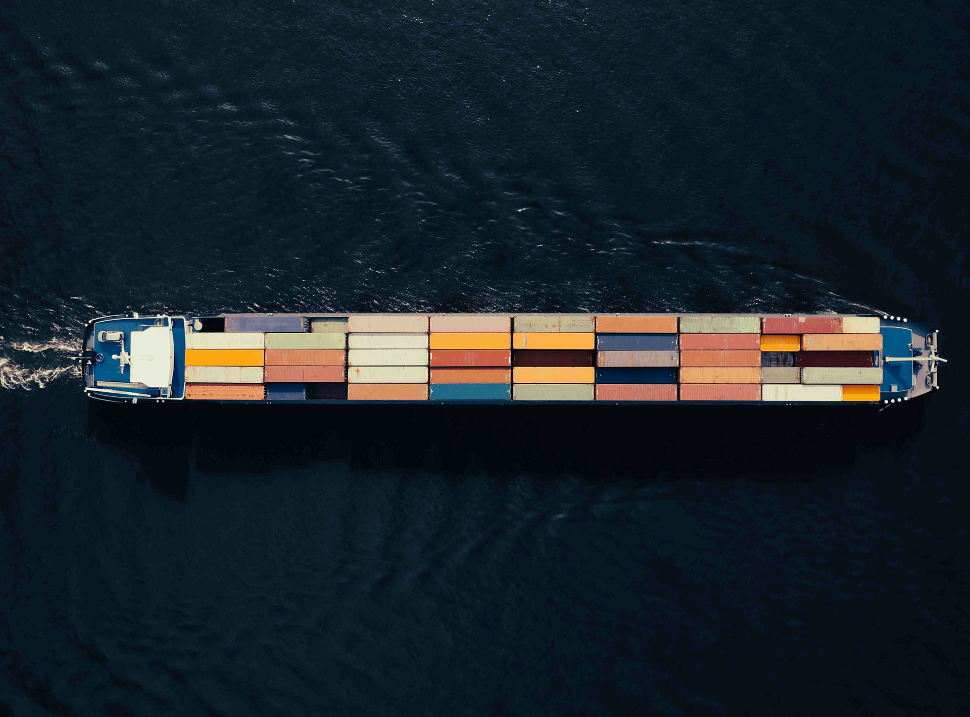 a-large-container-ship-in-a-body-of-water