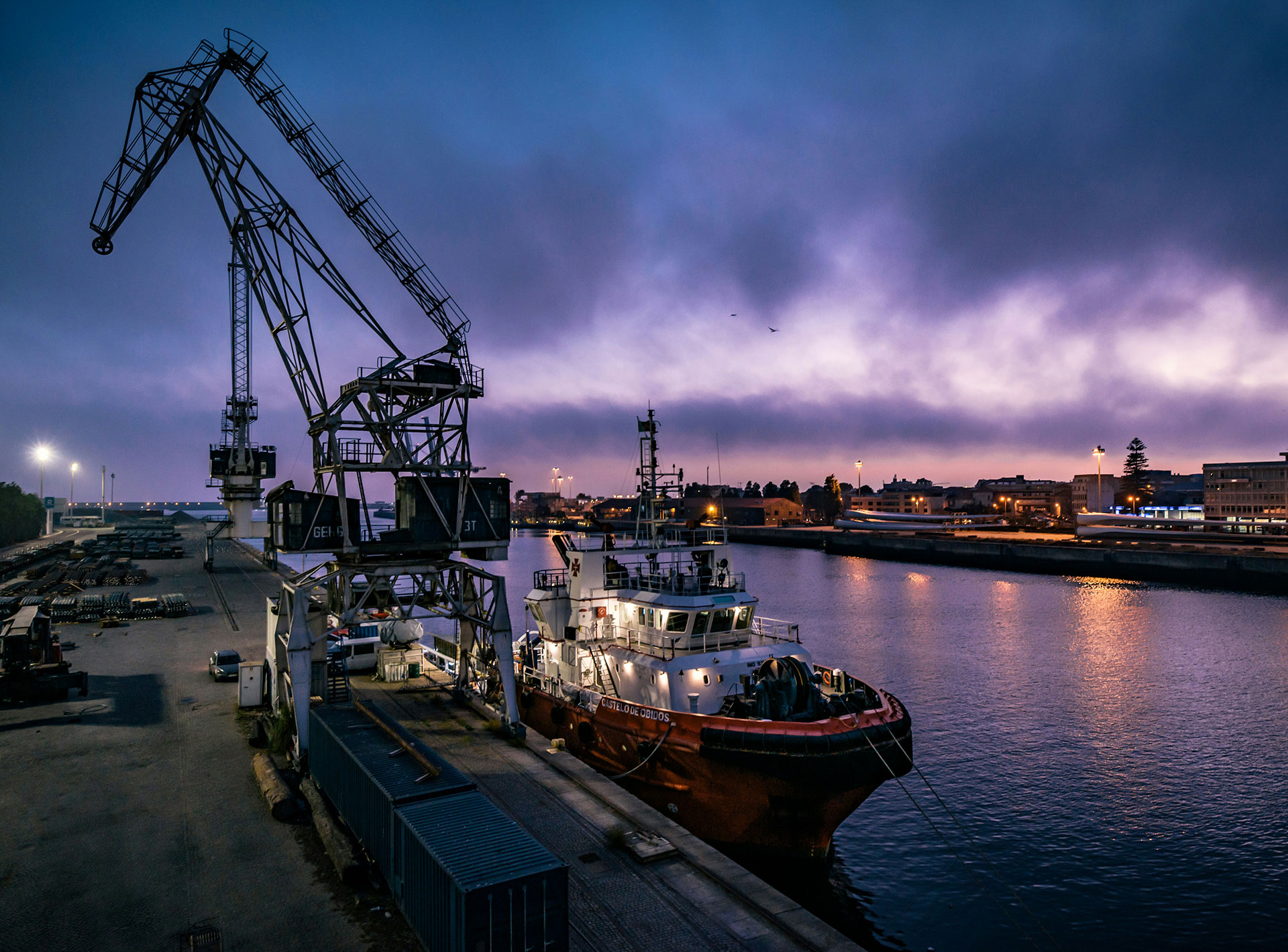 white-and-red-boat-on-dock-during-night-time