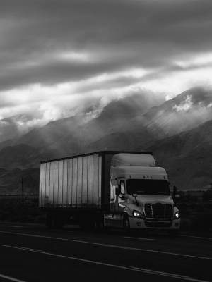 white-trailer-truck-on-road